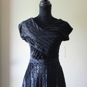 Black suede dress with pretty crisscross front